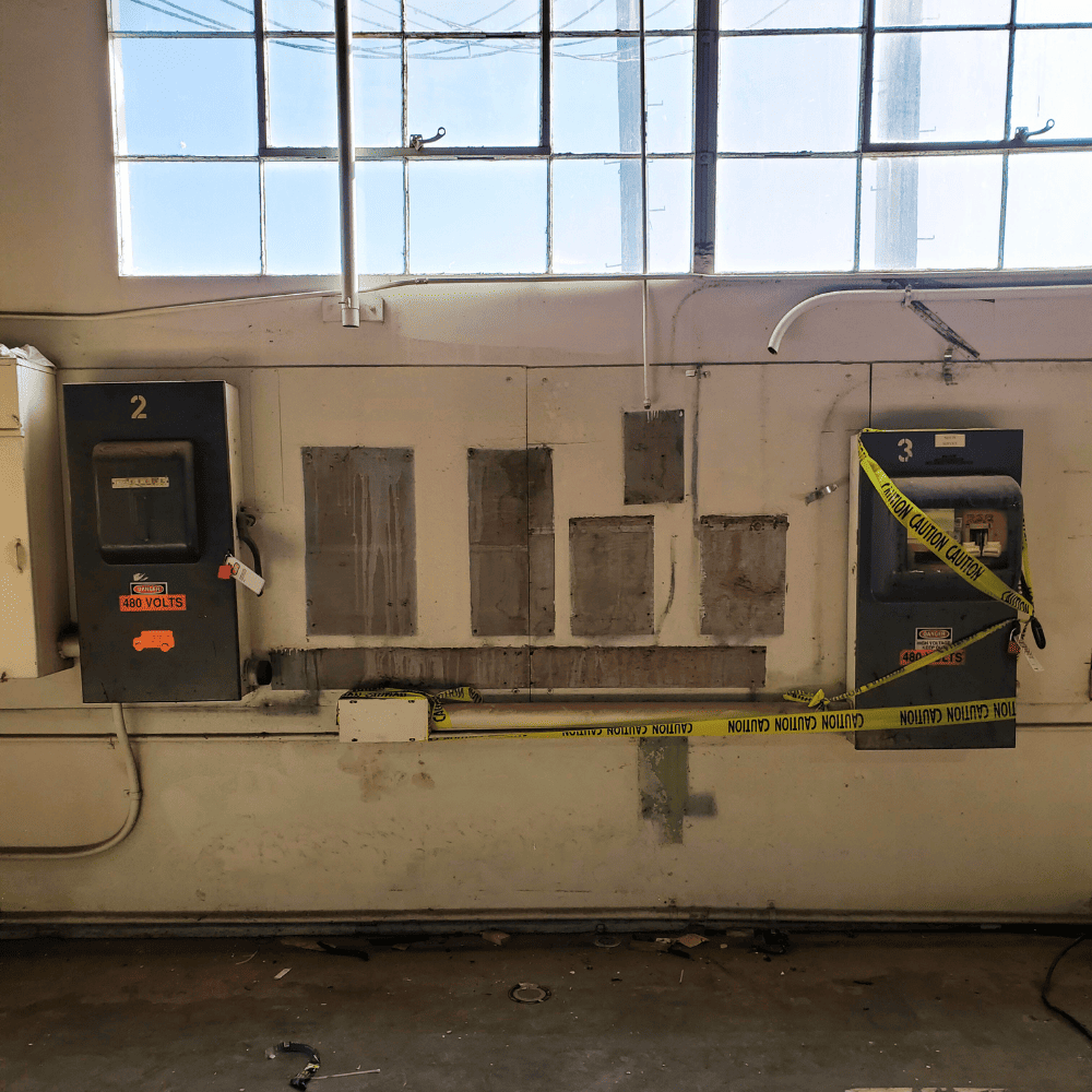 Electricians reviewing blueprints