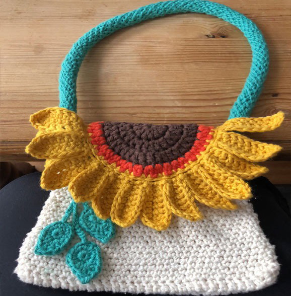 Handmade sunflower crochet bag by Cacklebury Creations