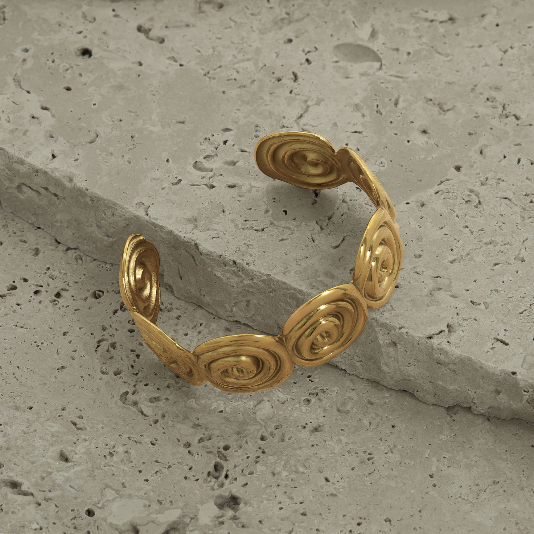 Bracelet styled on natural stones and photographed in a Brisbane studio, highlighting design, texture, and visual appeal for lifestyle and marketing images
