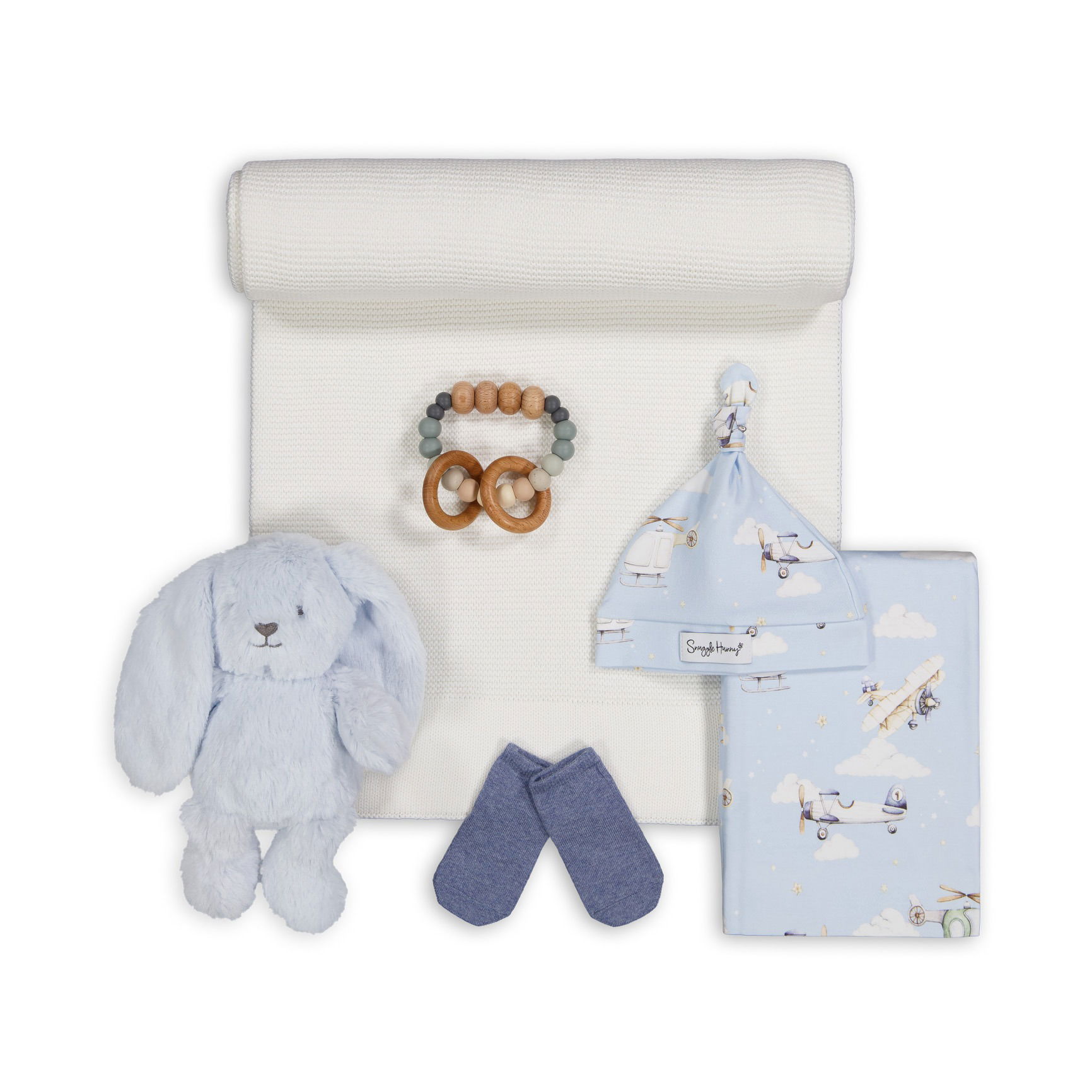 Coordinated baby set photographed in Brisbane, featuring soft fabrics and essential items in an attractive layout.