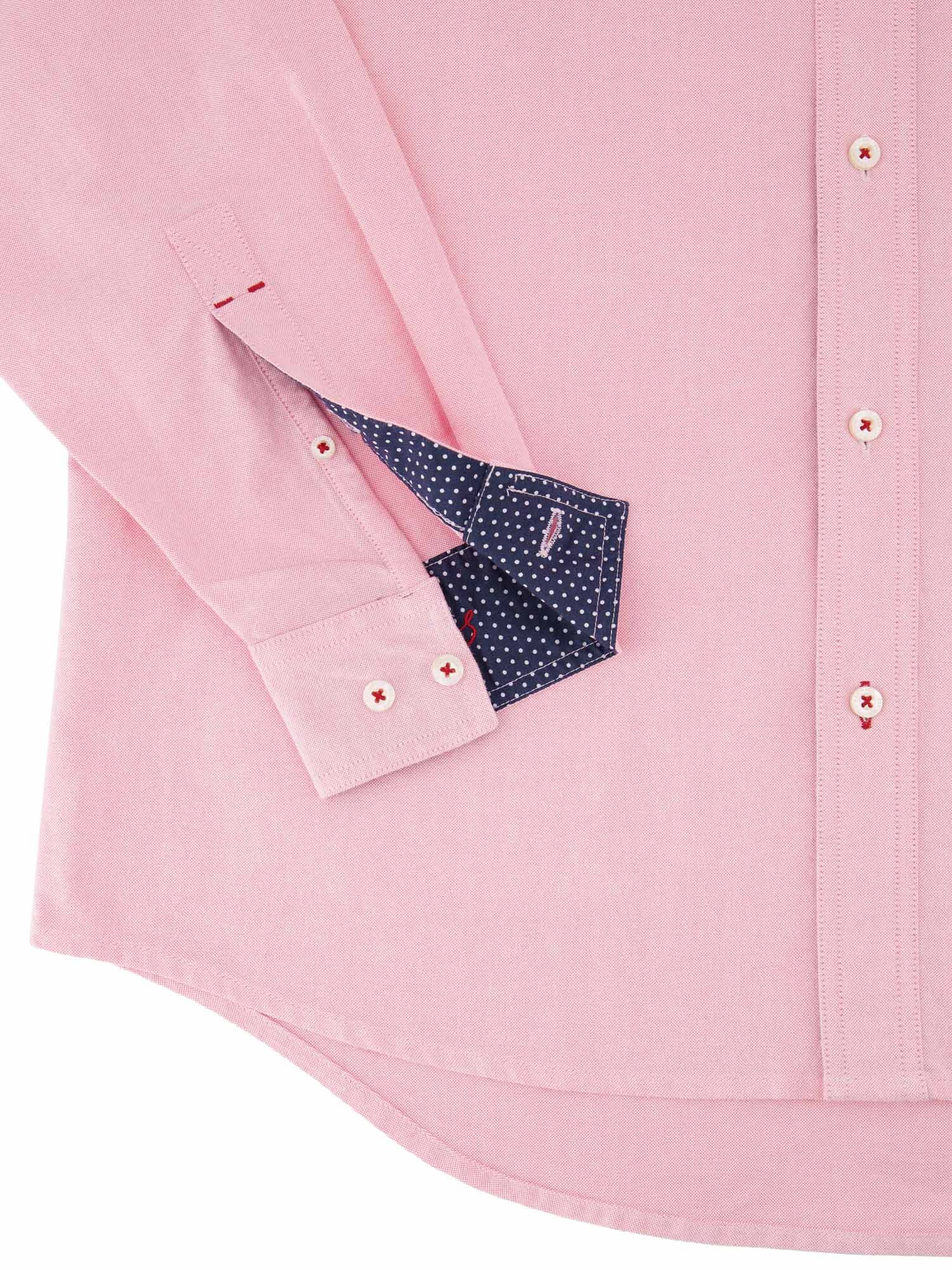 High-quality flatlay shot highlighting intricate embroidery and fabric texture.