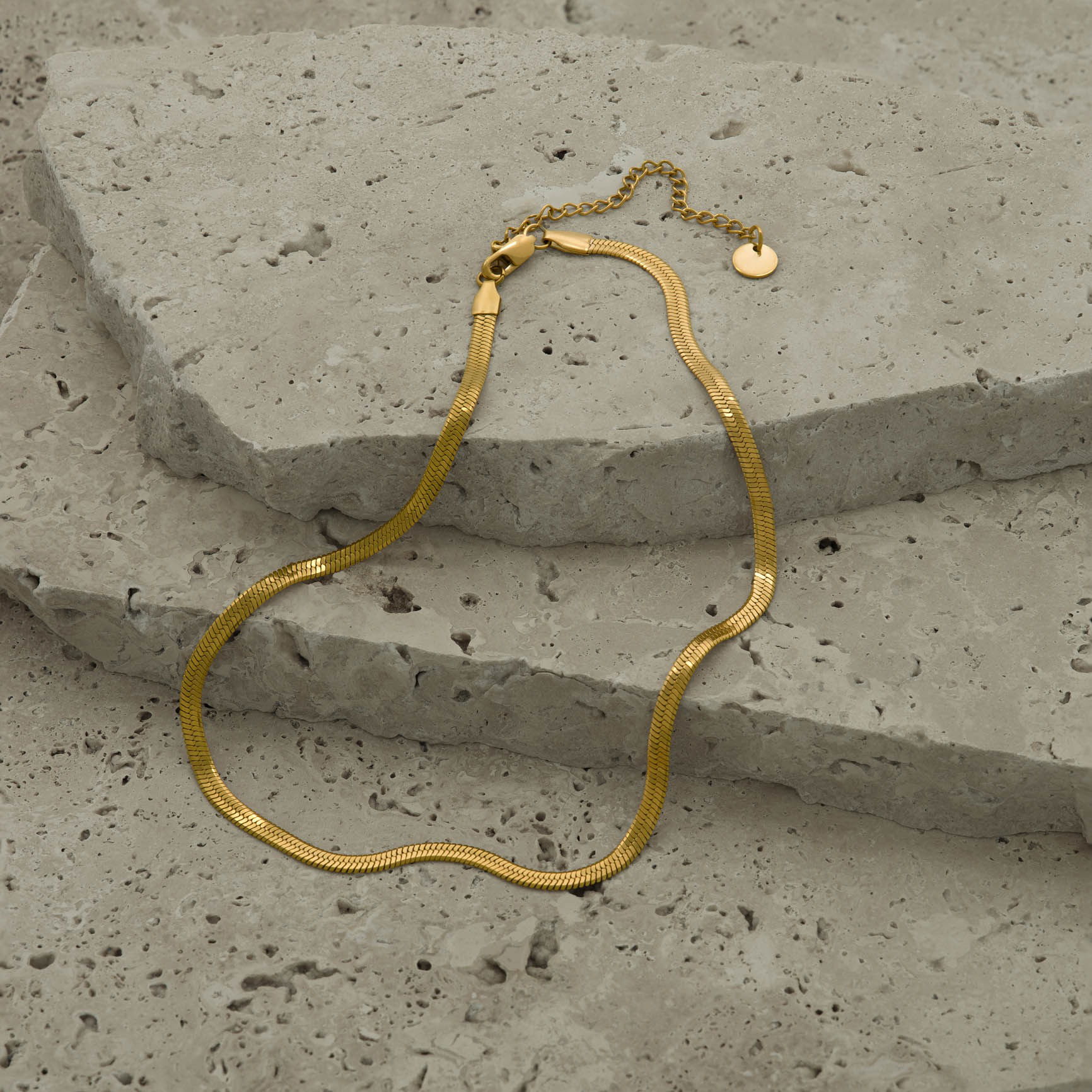 Necklace styled on natural stones and photographed in a Brisbane studio, highlighting design, texture, and visual appeal for lifestyle and marketing images