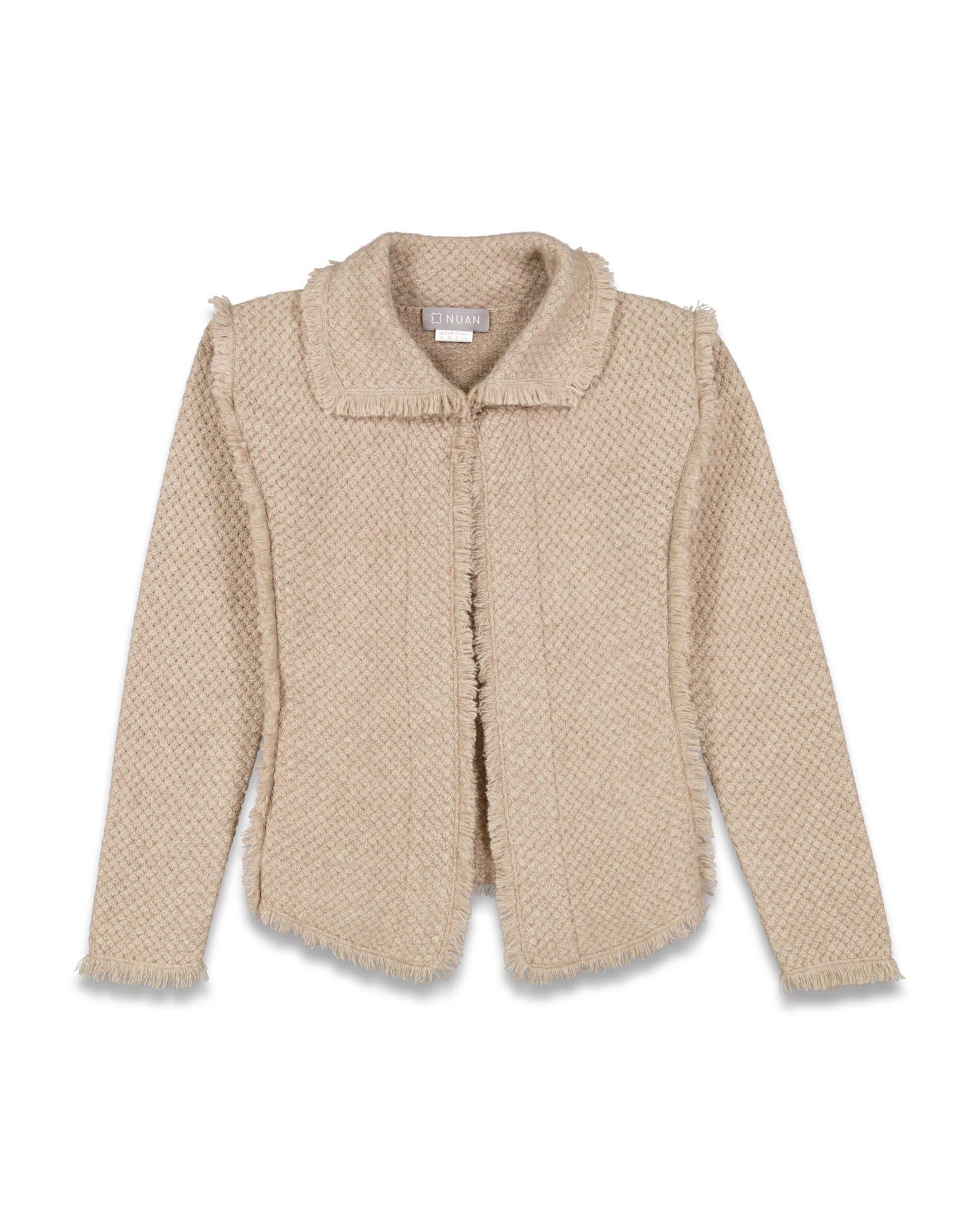 Detailed flat lay shot of a sweater, focusing on texture and craftsmanship.