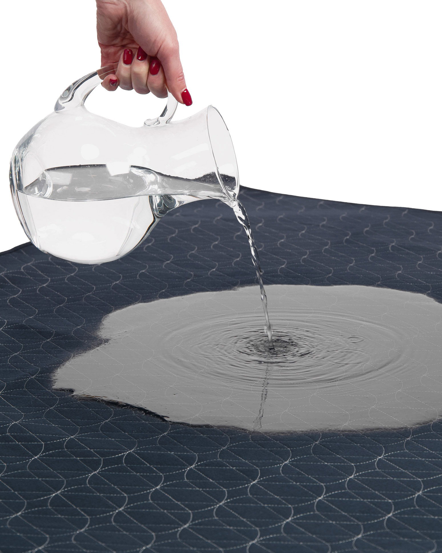 Close-up studio photo showing material and texture of waterproof bed pad photographed in Brisbane