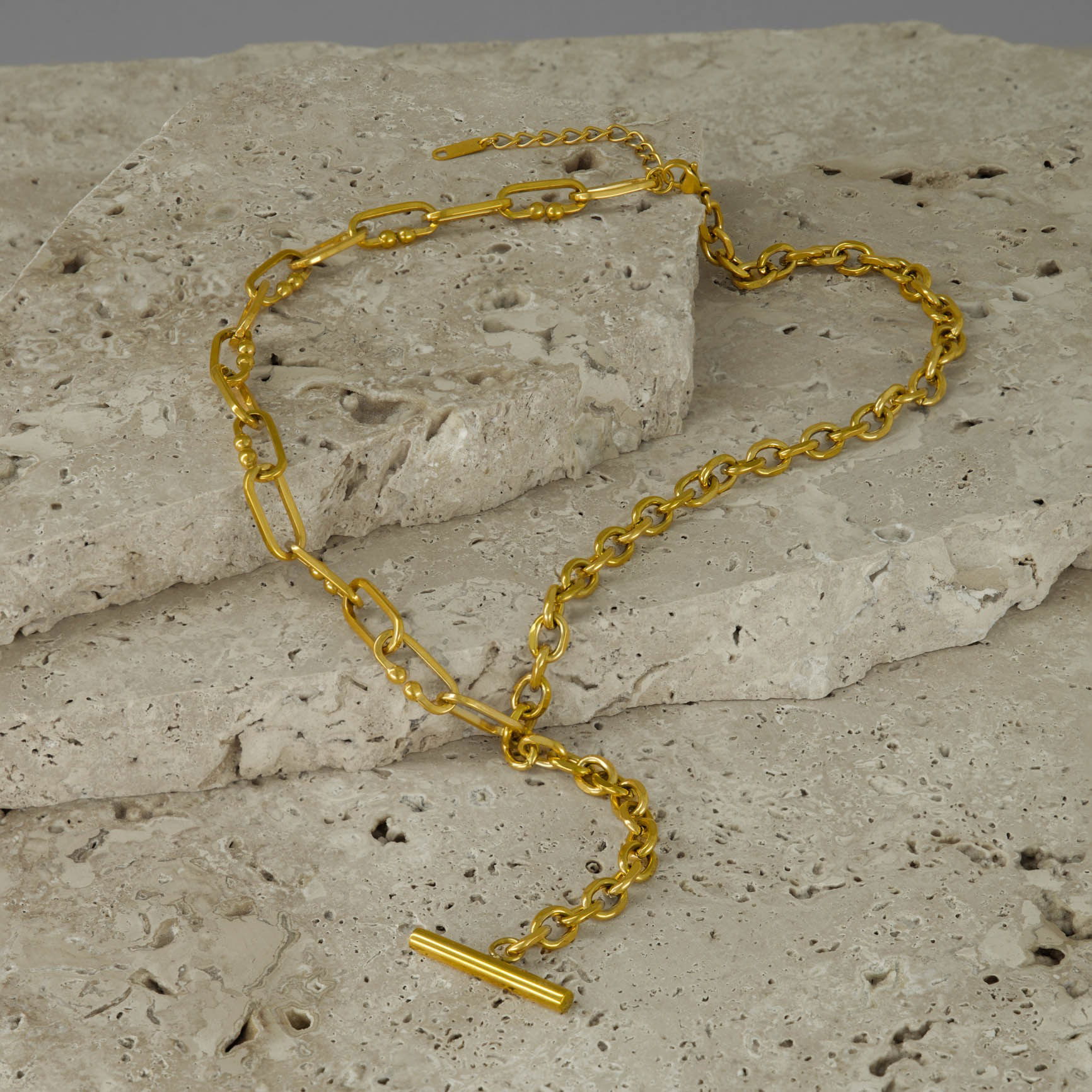 Necklace styled on natural stones and photographed in a Brisbane studio, highlighting design, texture, and visual appeal for lifestyle and marketing images