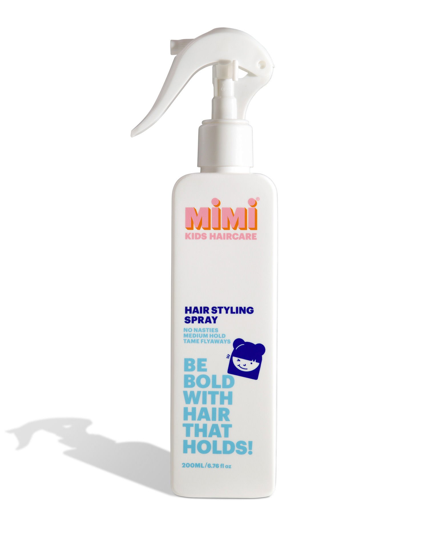 Kids hair styling spray photographed in a Brisbane studio, highlighting packaging, branding, and easy-to-use design