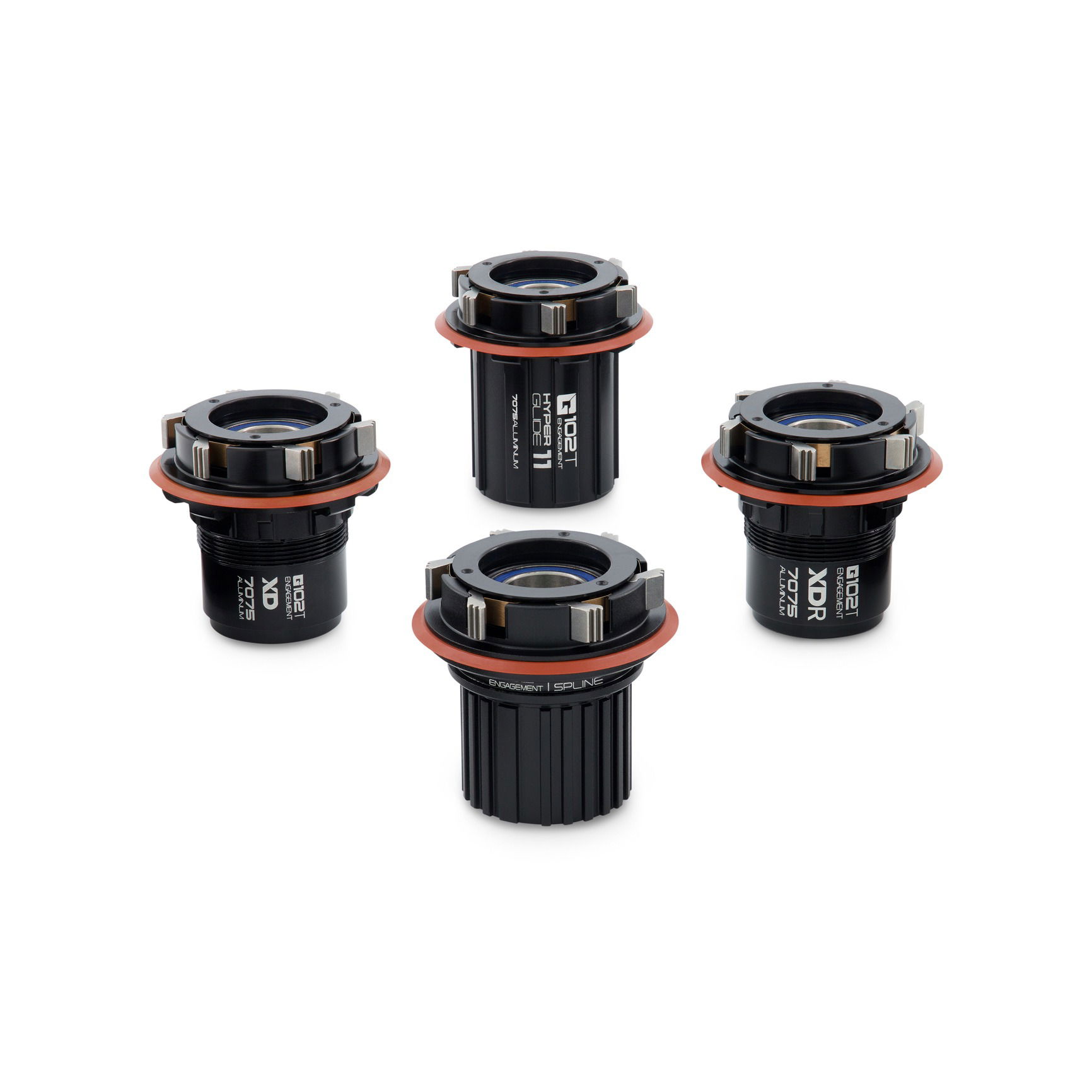 Group shot of metal bicycle freehubs photographed on white background at VERAS Studio