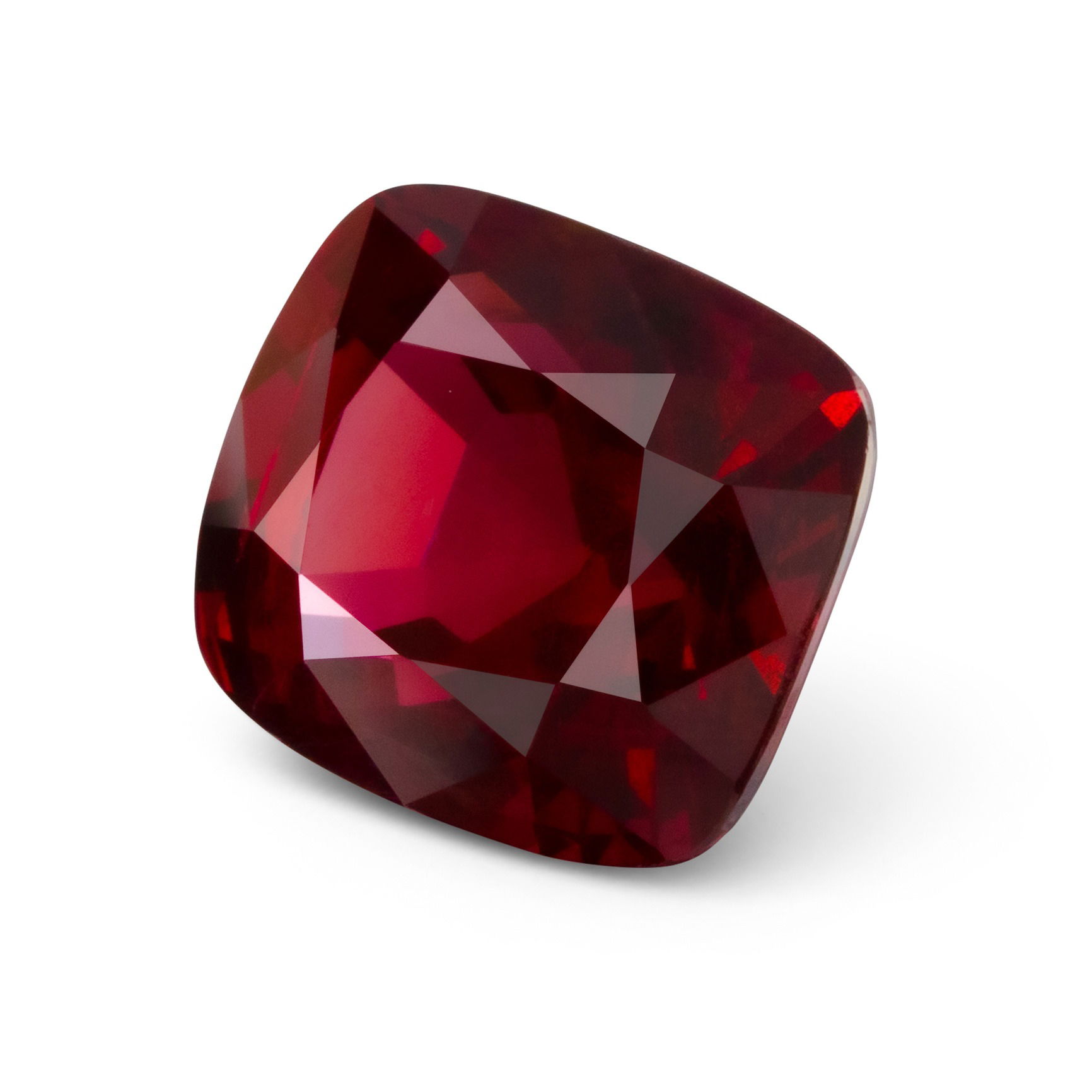 Side view of a ruby gemstone photographed in a Brisbane studio, showing depth, facets, and color intensity