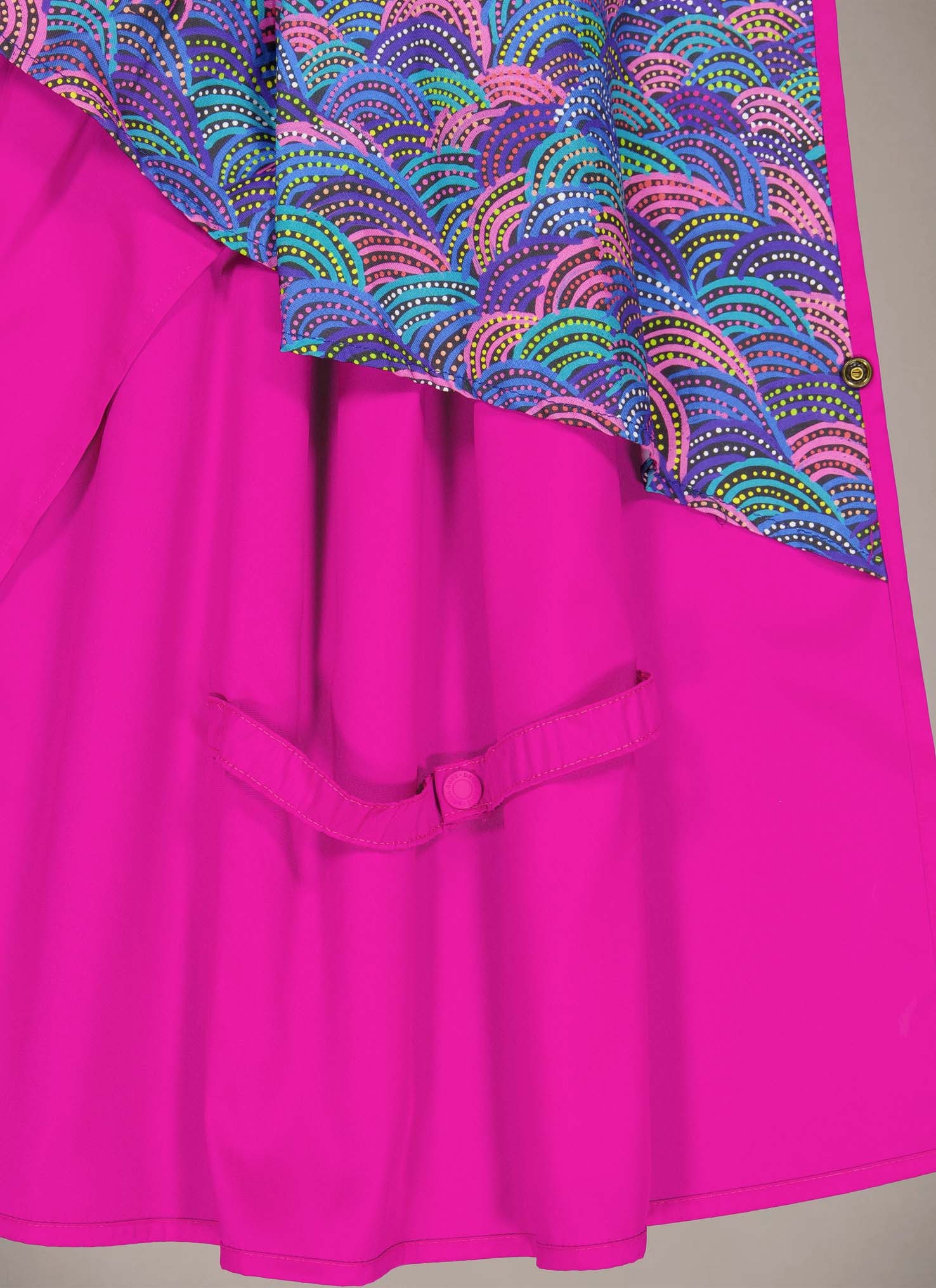 High-quality flatlay shot highlighting intricate embroidery and fabric texture.