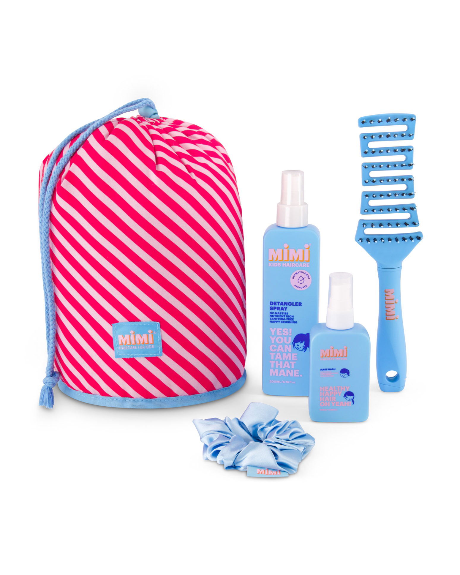 Kids hair care set photographed in a Brisbane studio, featuring hair wash, styling gel, and styling spray in a coordinated layout