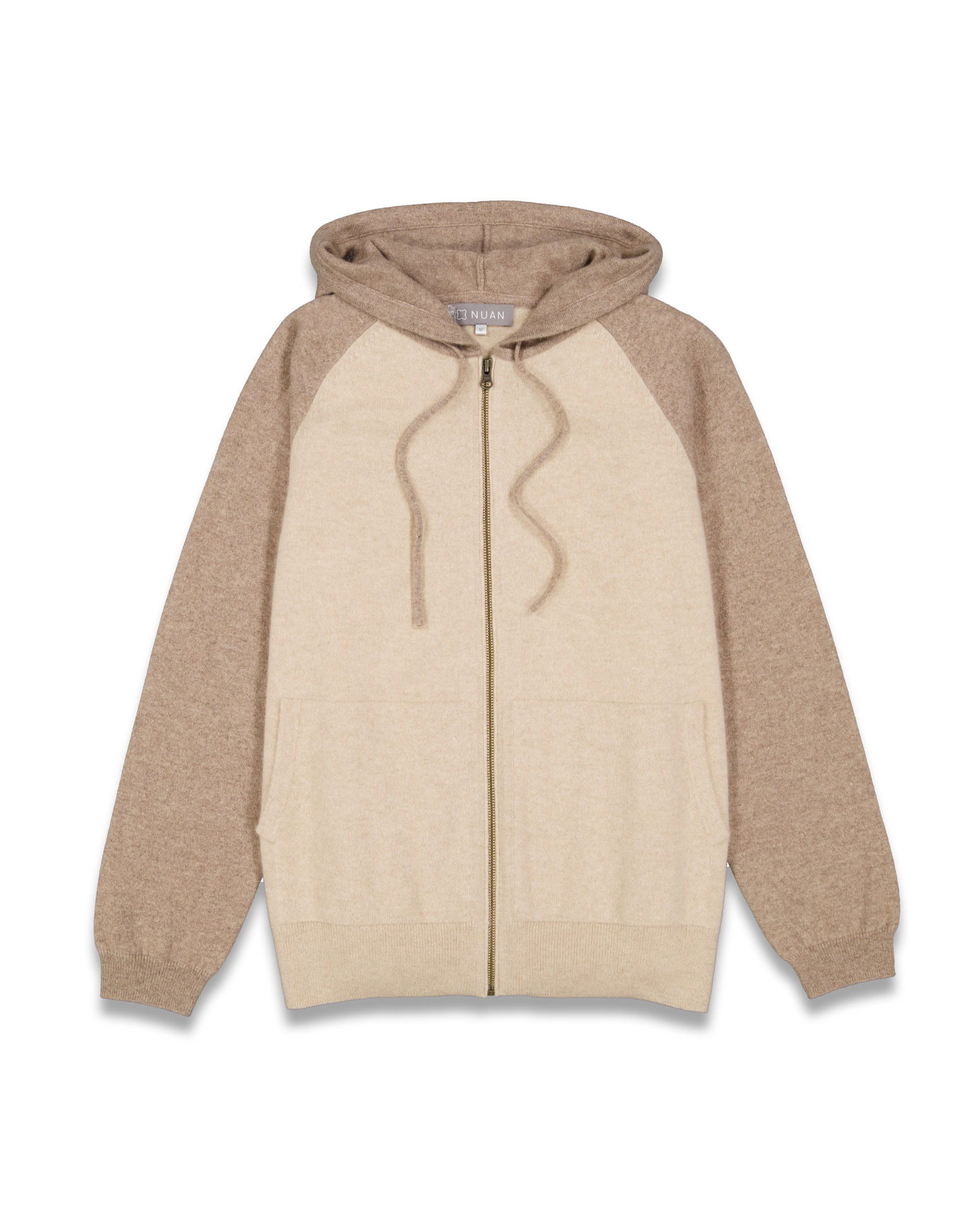 Detailed flat lay shot of a sweater, focusing on texture and craftsmanship.