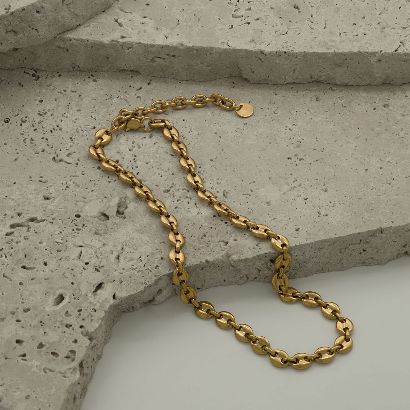Necklace styled on natural stones and photographed in a Brisbane studio, highlighting design, texture, and visual appeal for lifestyle and marketing images