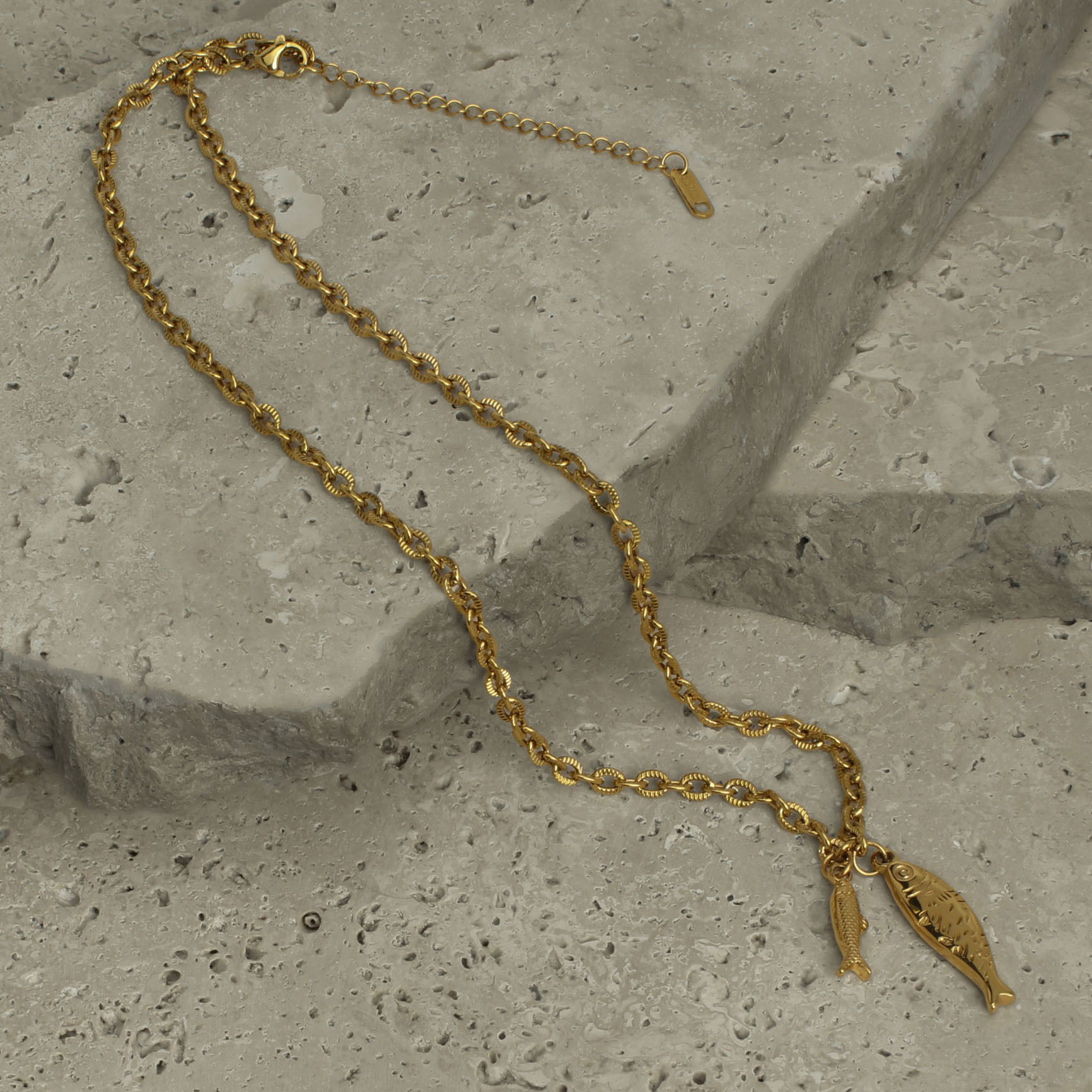Necklace styled on natural stones and photographed in a Brisbane studio, highlighting design, texture, and visual appeal for lifestyle and marketing images