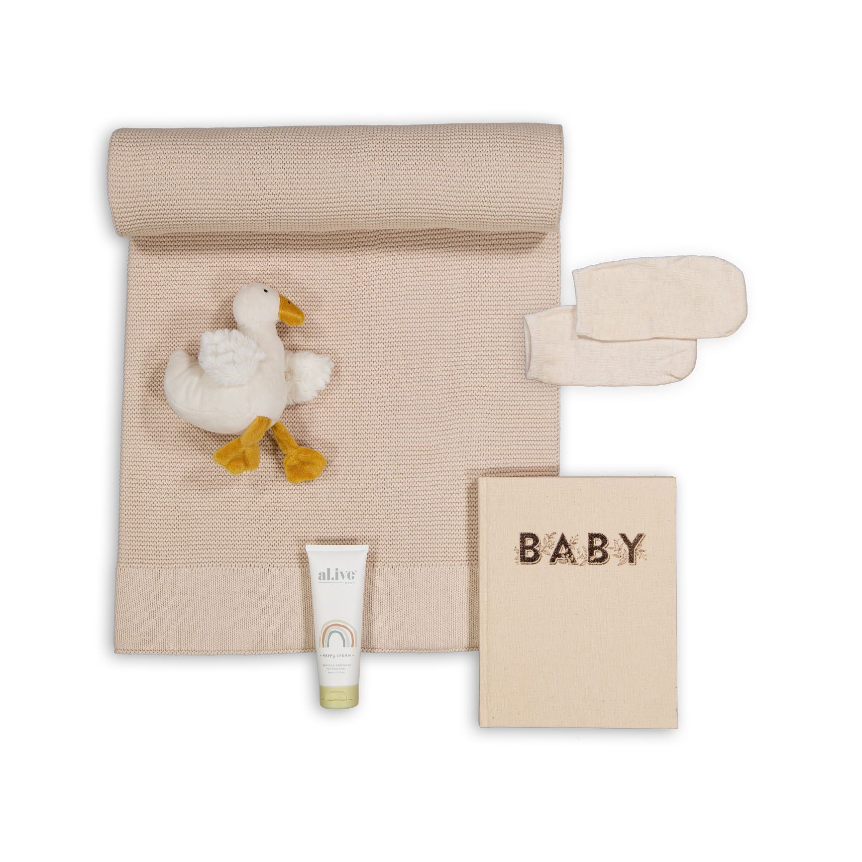 Baby gift set photographed in a Brisbane studio, featuring a soft blanket, plush toy, and coordinated essentials.