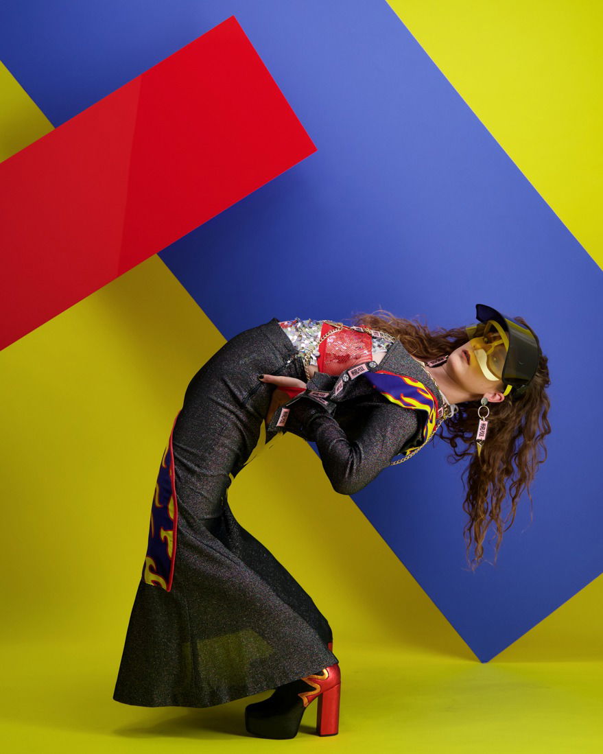 Creative model shot against colourful background